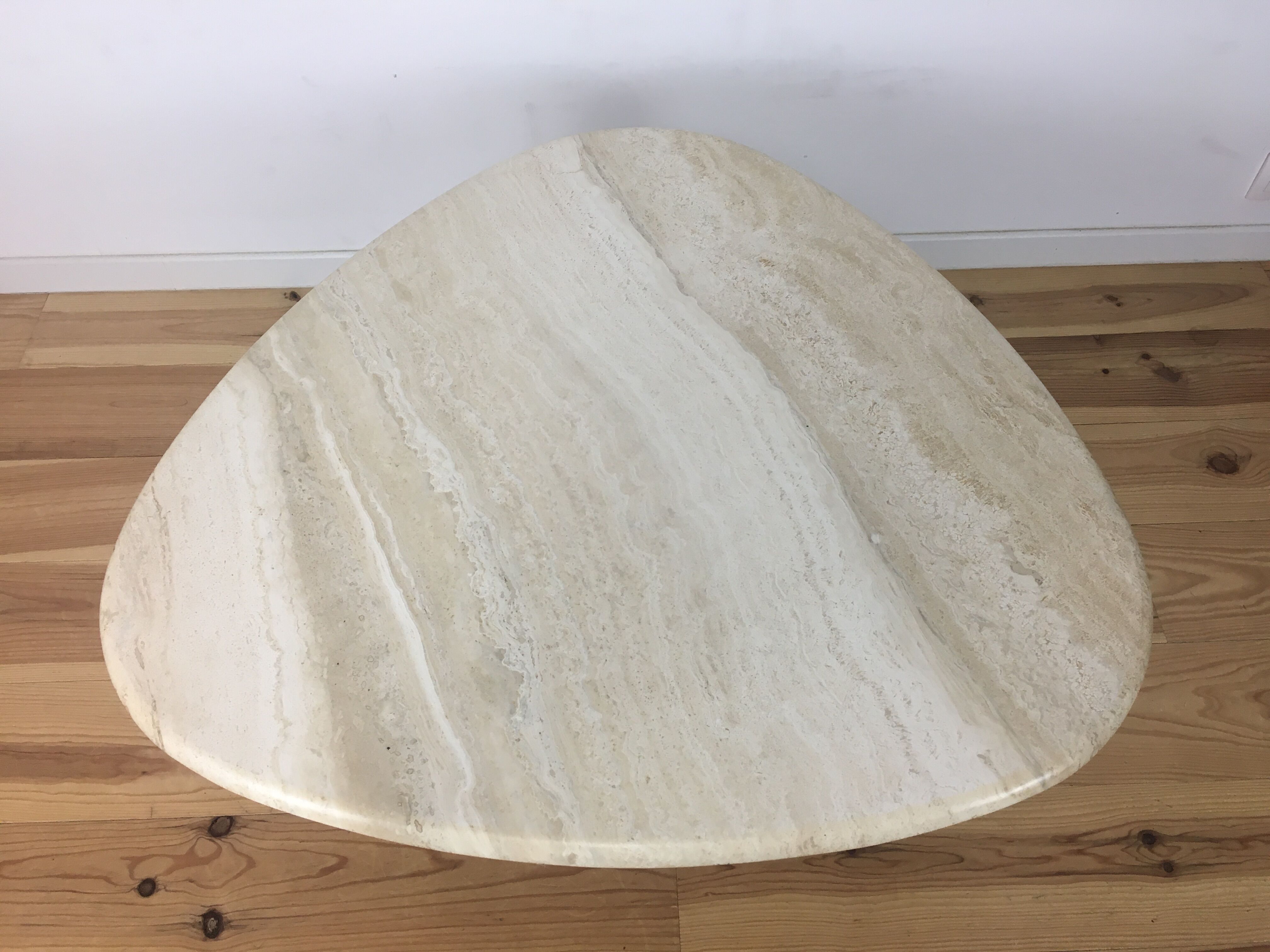 Travertine coffee table goes up and down to jack