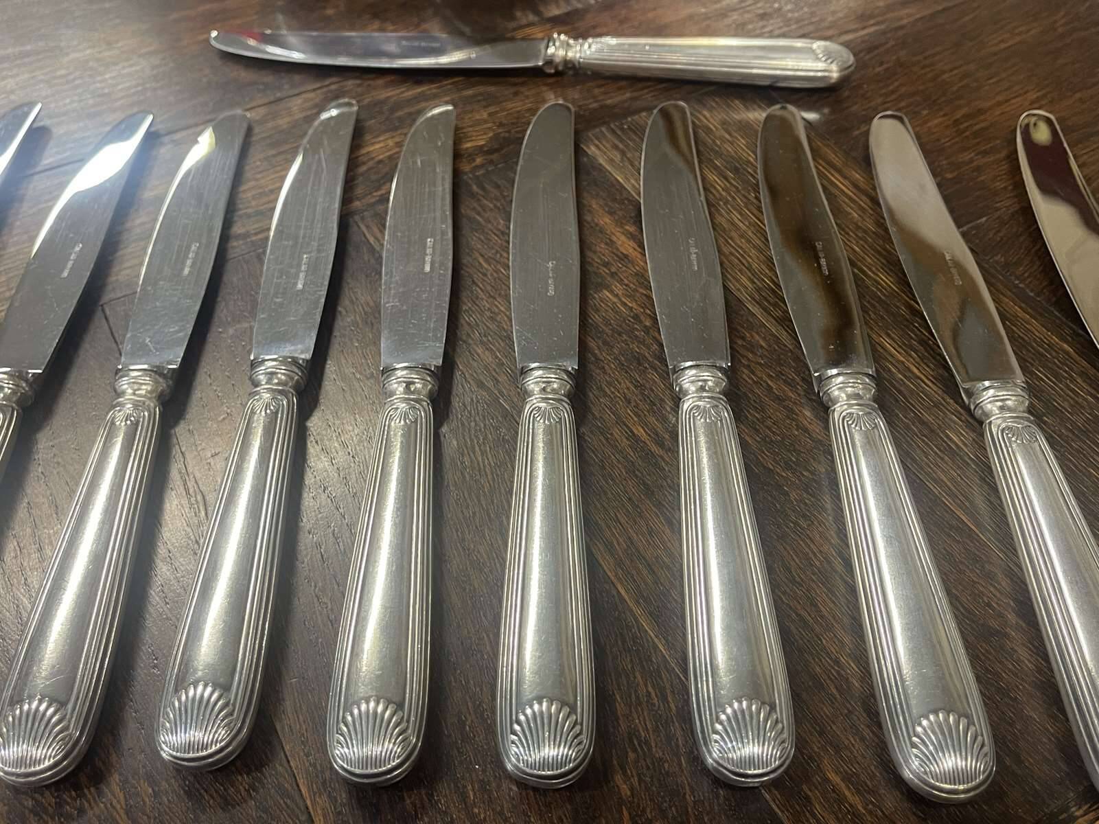 Set of 12 silver-plated metal knives, shell model, from CAILAR BAYARD
