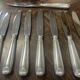 Set of 12 silver-plated metal knives, shell model, from CAILAR BAYARD