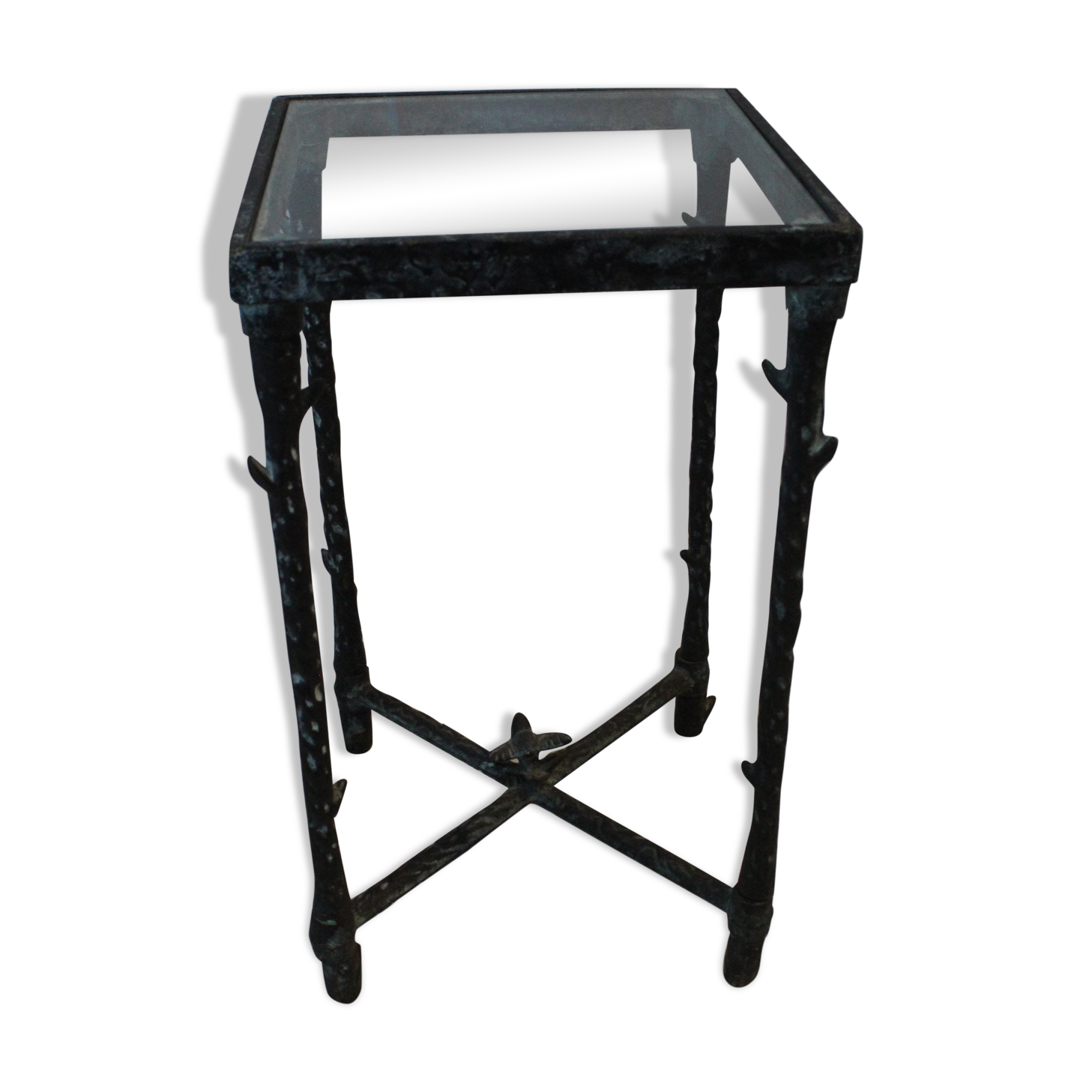 Giacometti style cast iron table, glass table