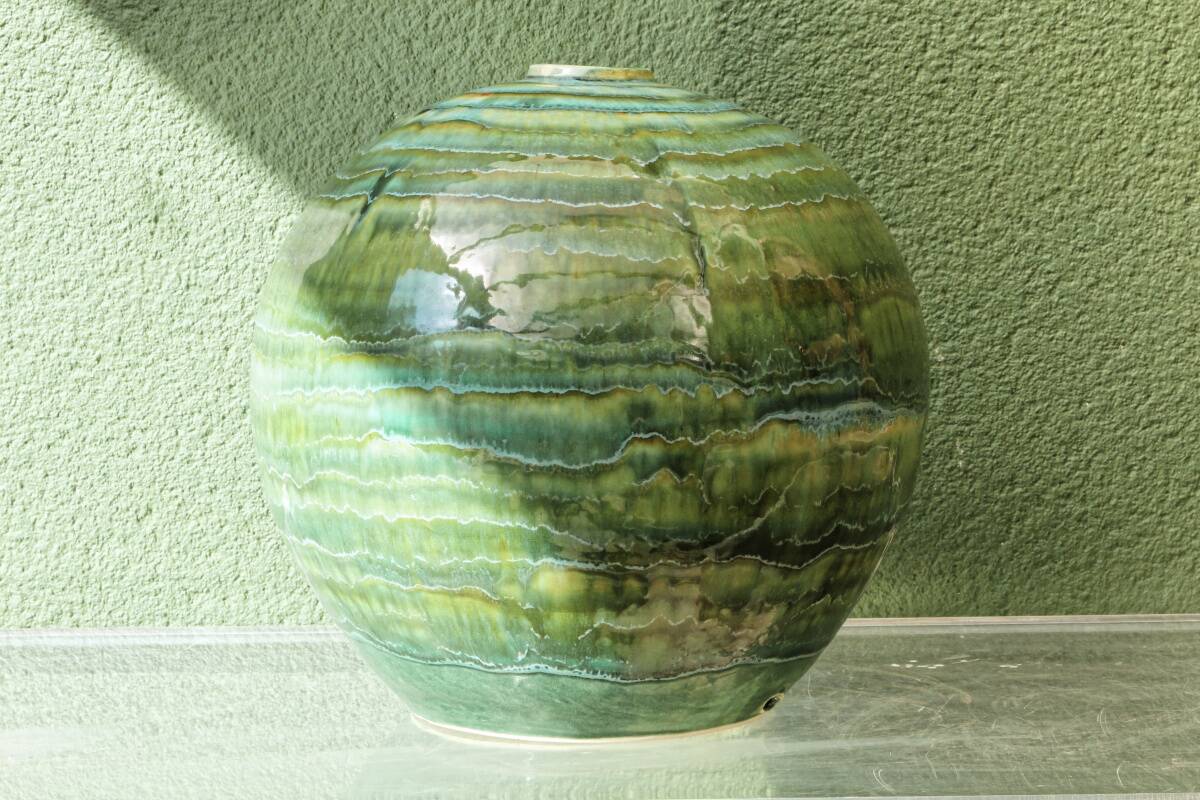 Glazed ceramic ball lamp base, green gradients.
