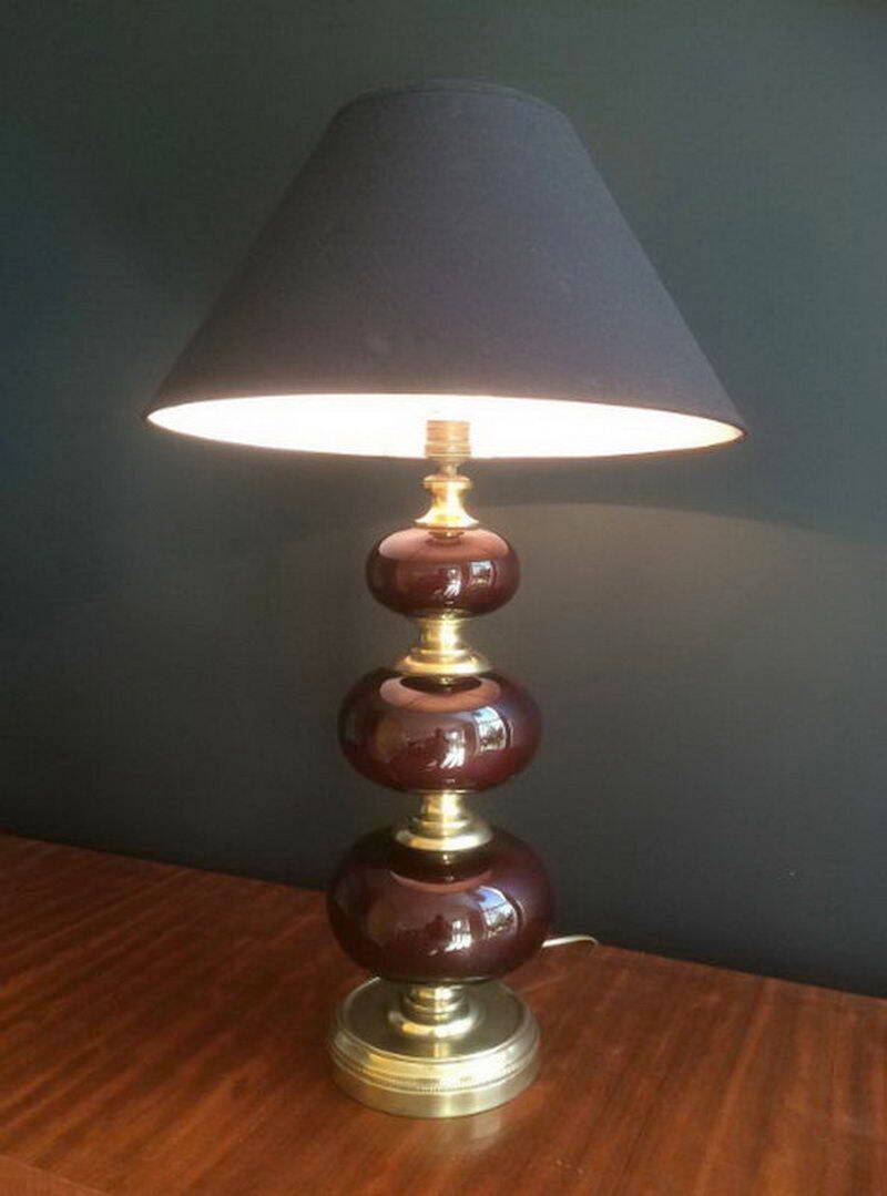 Lamp made of brass and red colored glass