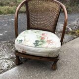 Vintage brown armchair in floral fabric and mahogany wood, 1950s, low back.