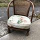 Vintage brown armchair in floral fabric and mahogany wood, 1950s, low back.