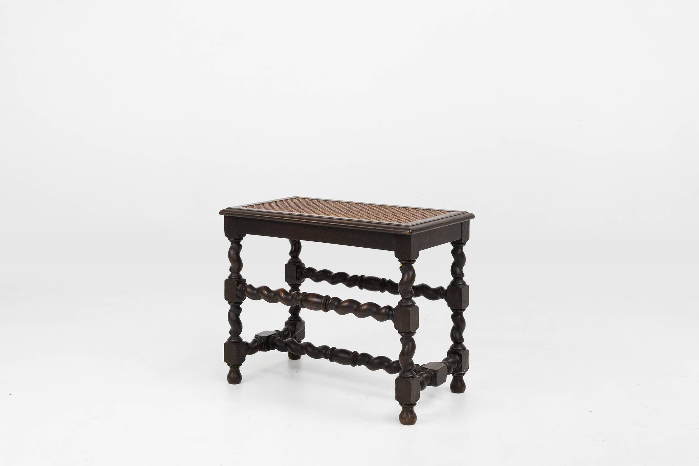 Antique French wooden stool with rattan top, ca. 1880