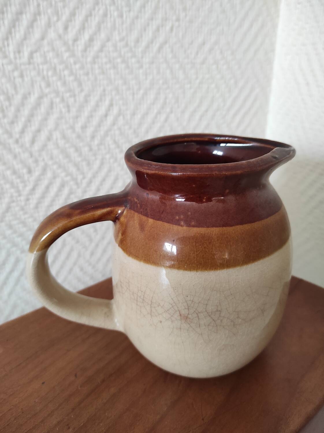 Glazed ceramic pitcher