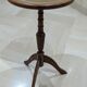 English style gueridon in wood – top covered with green/gold leather