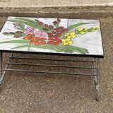 Vintage rectangular coffee table with ceramic inlaid flowers and steel.