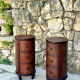 Pair of cylindrical bedside tables or drum bedside tables in exotic wood.