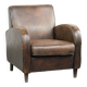 Comfortable sheepskin armchair with matching piping and a timeless look