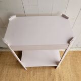 Small renovated Art Deco console in nude colour.