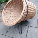 scandinavian  midcentury magazine holder in wicker and with metall legs