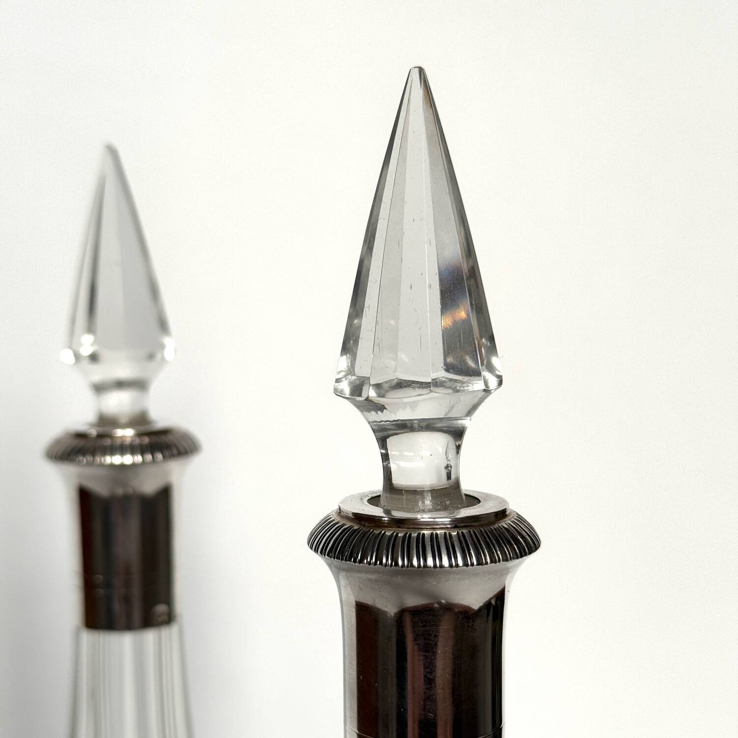 Pair of crystal decanters with solid silver mounts