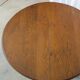 1930s oak dining table, slightly oval.