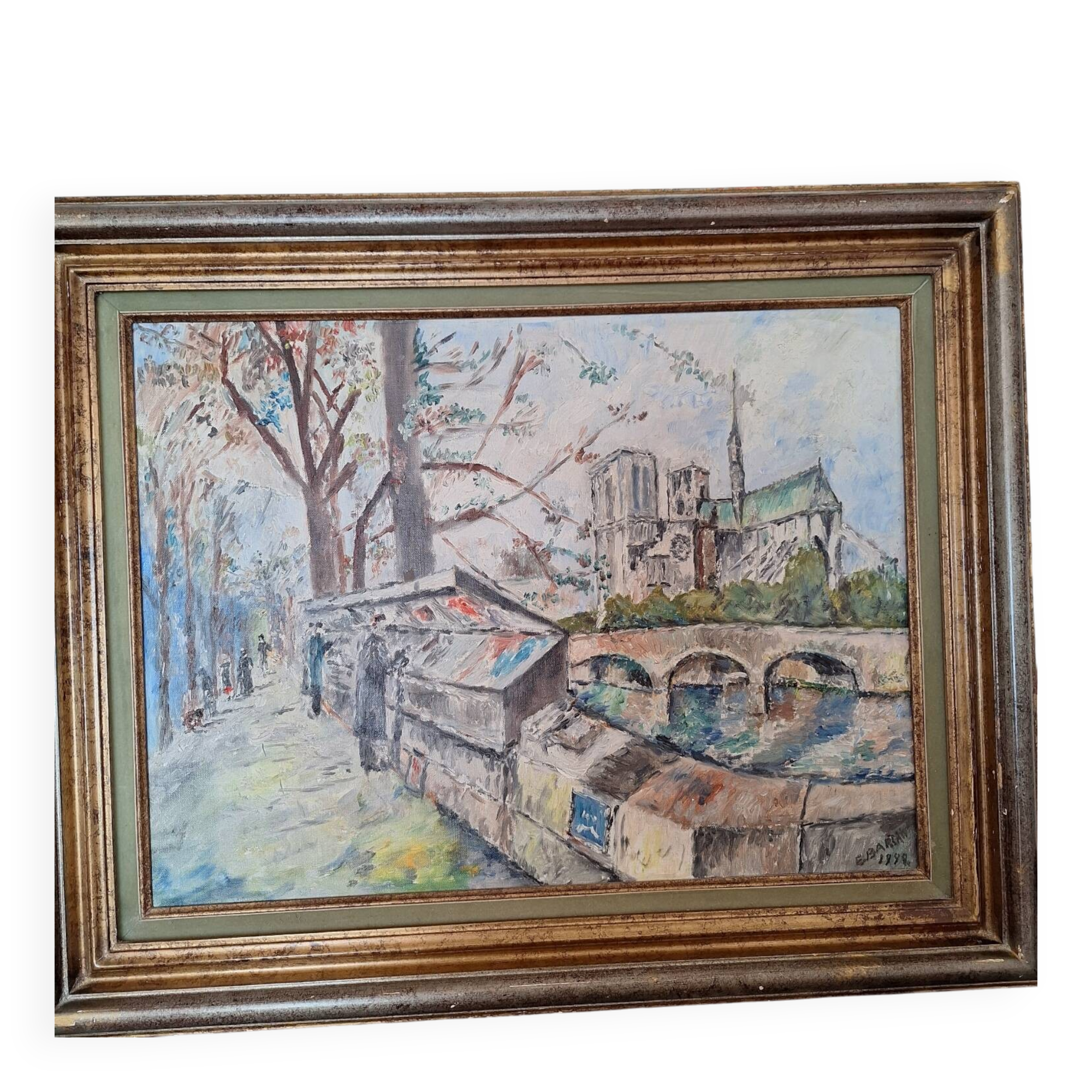 Oil painting depicting the Quai de Seine and booksellers.