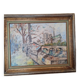 Oil painting depicting the Quai de Seine and booksellers.