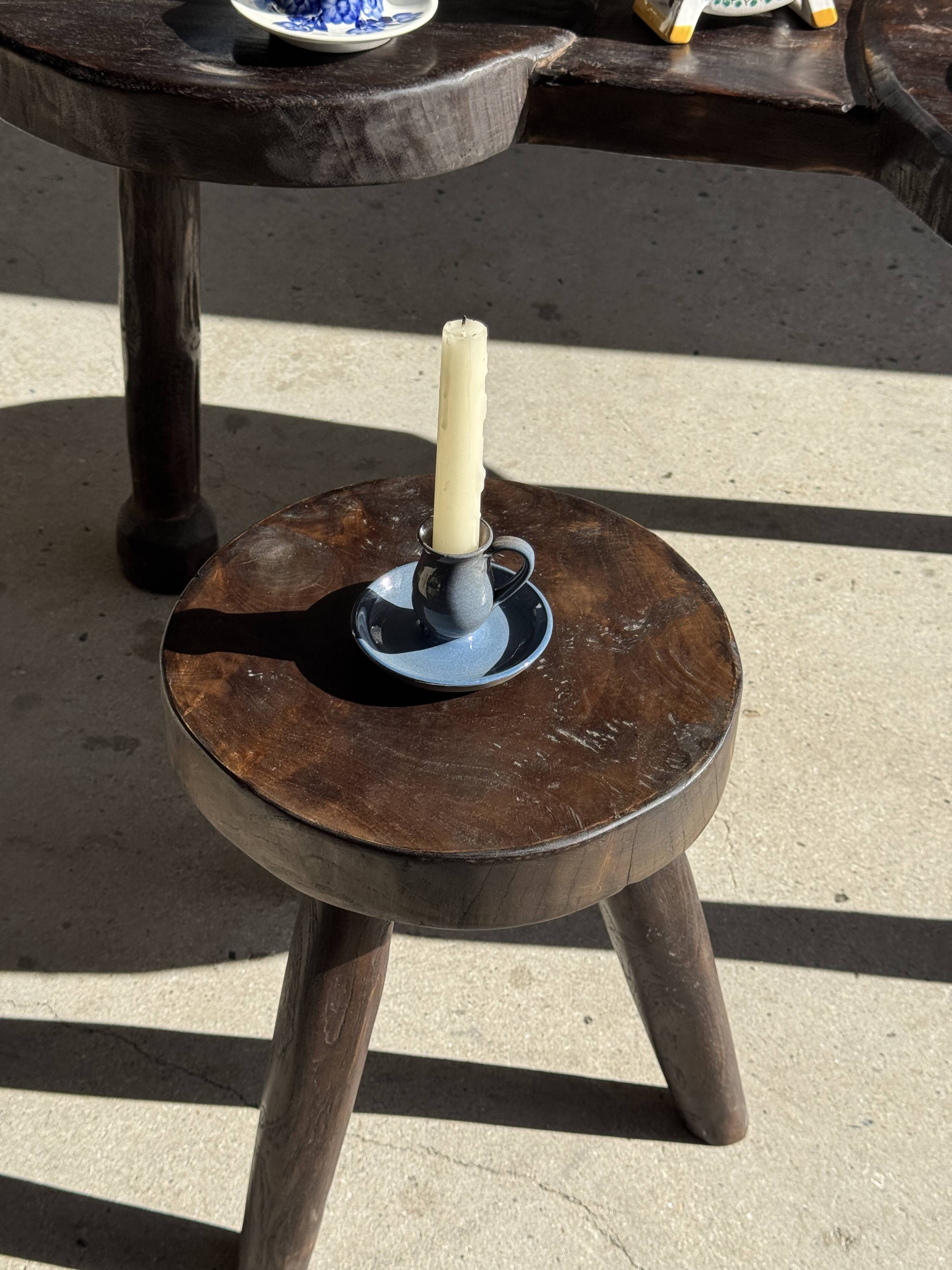 Vintage hand-held candlestick in blue glazed stoneware with floral decoration by Poterie Millian.