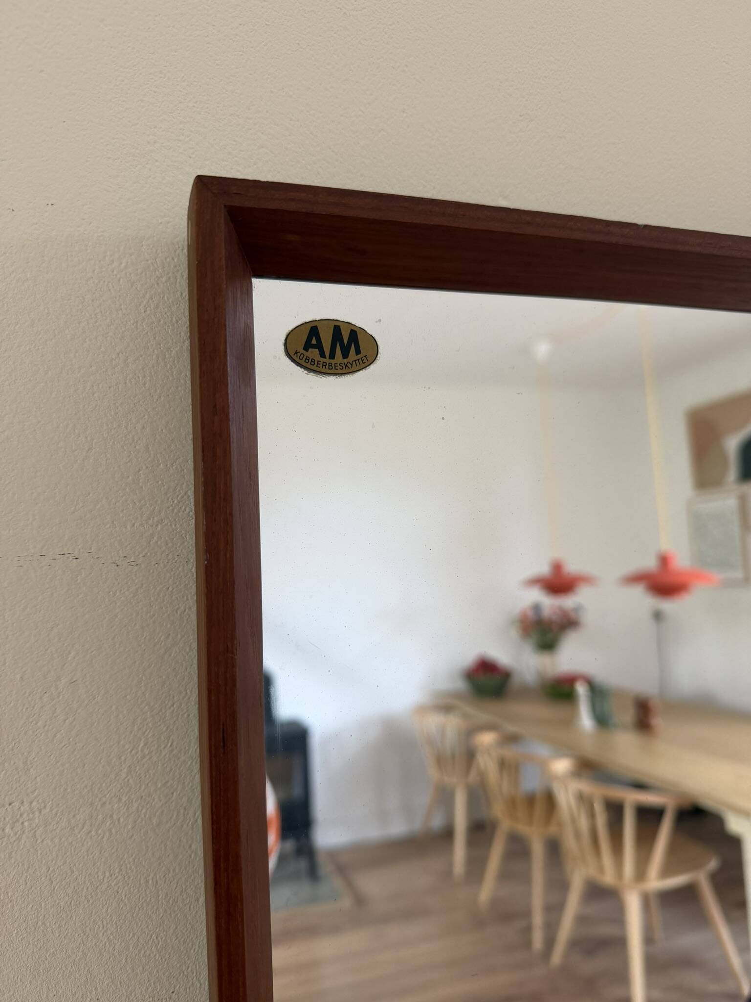 Beautiful vintage Danish teak mirror with mittered edges and nice brass det