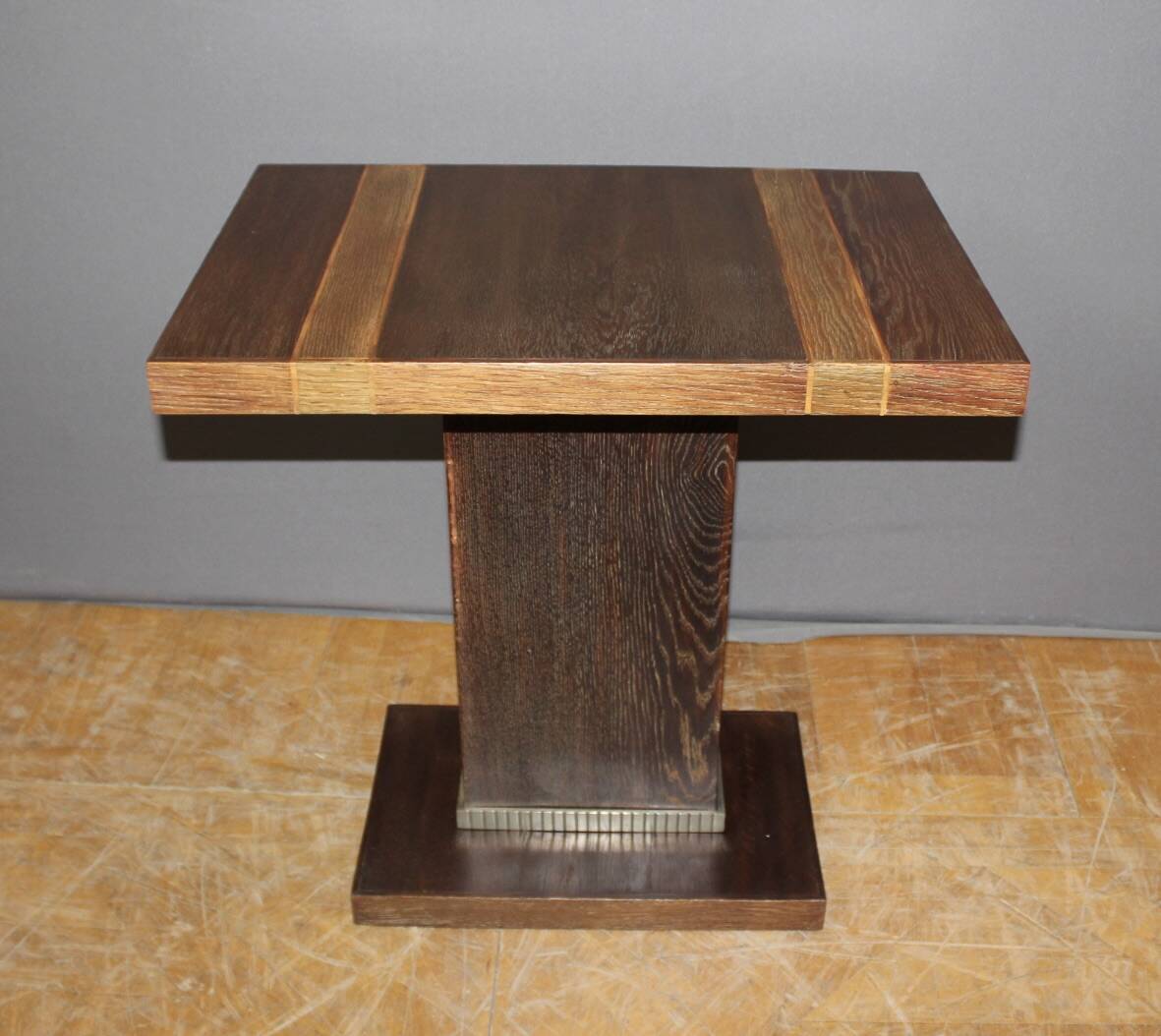 Art Deco period pedestal table in oak and nickel-plated bronze circa 1930