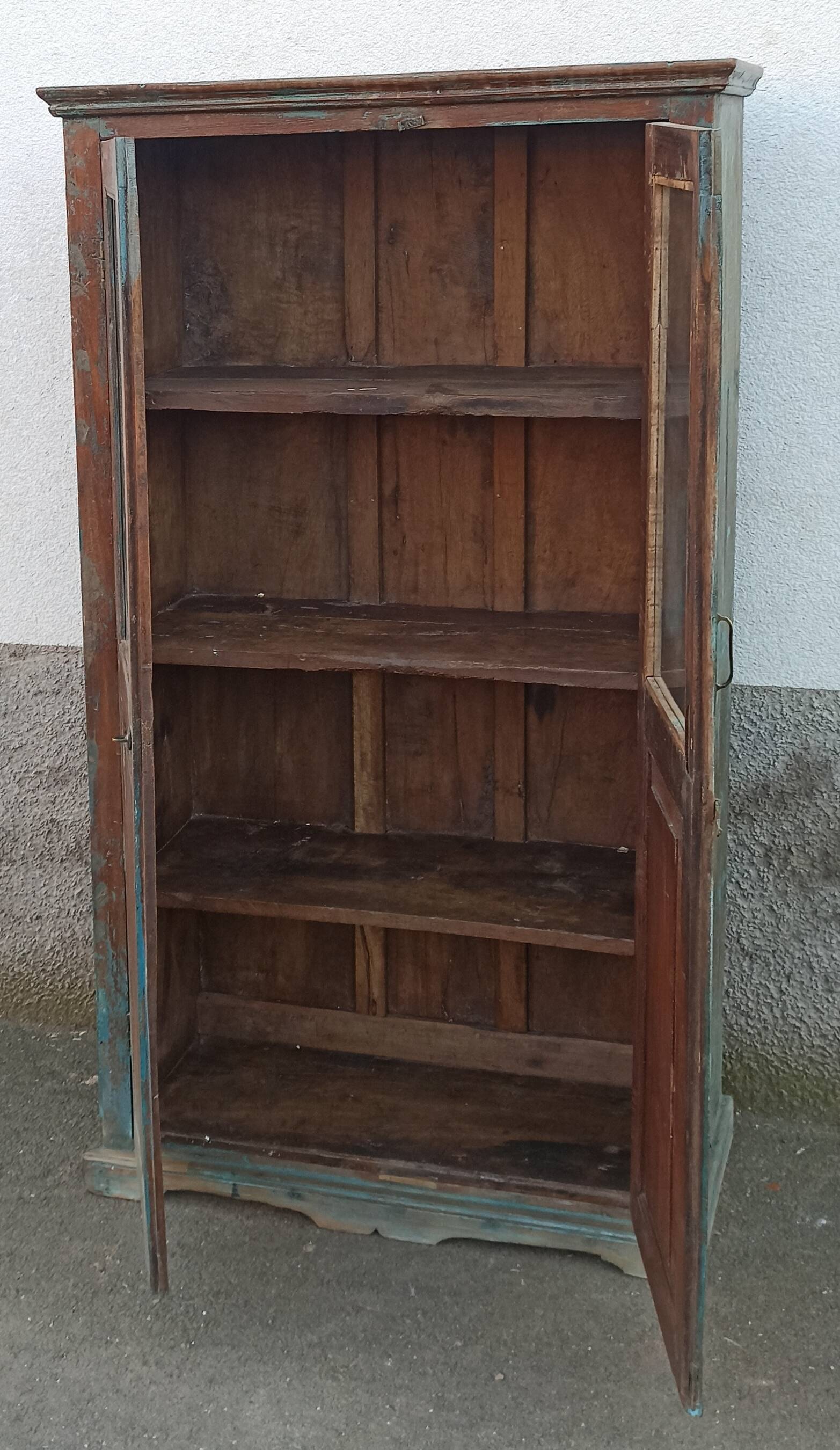 Old glazed wooden cabinet with beautiful patina