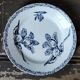 Set of four flat plates in iron earth