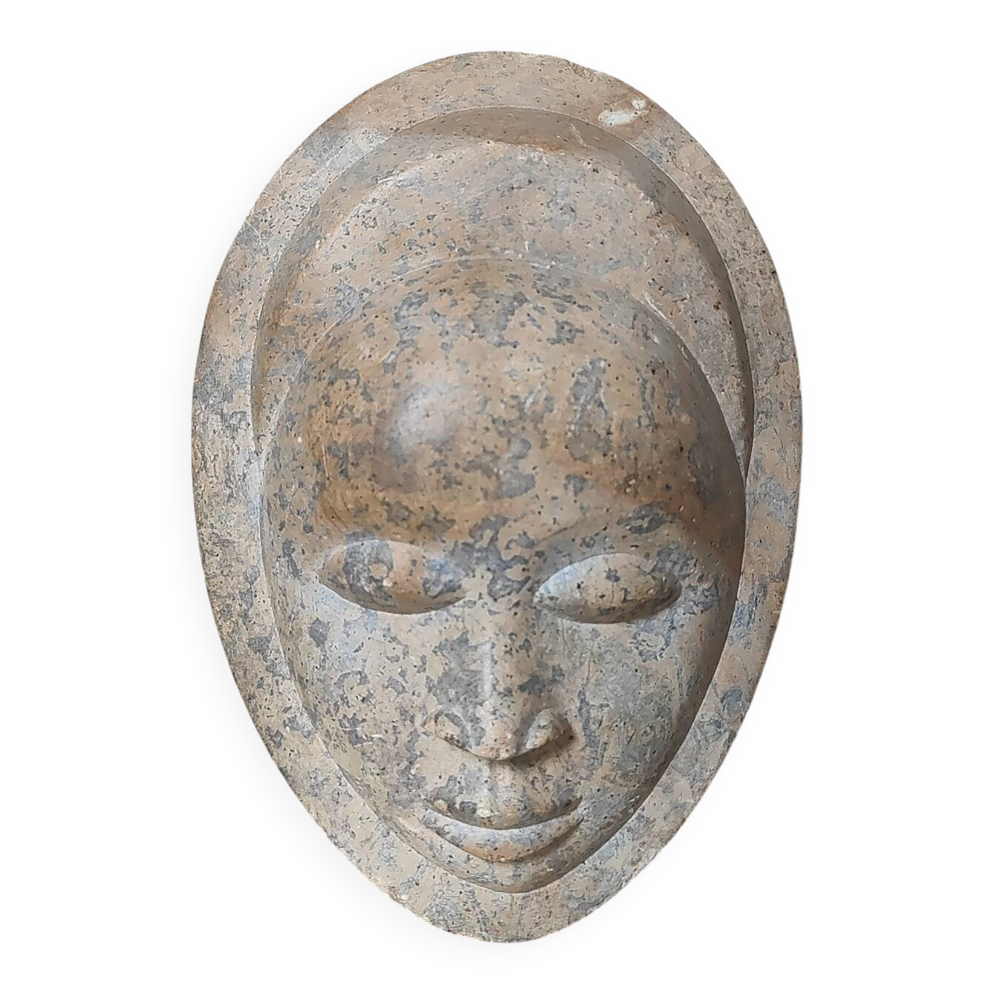 African stone face sculpture