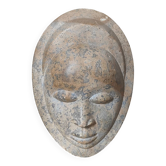 African stone face sculpture