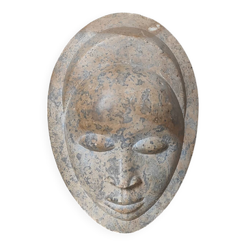 African stone face sculpture