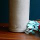 Enamelled white stoneware bottle