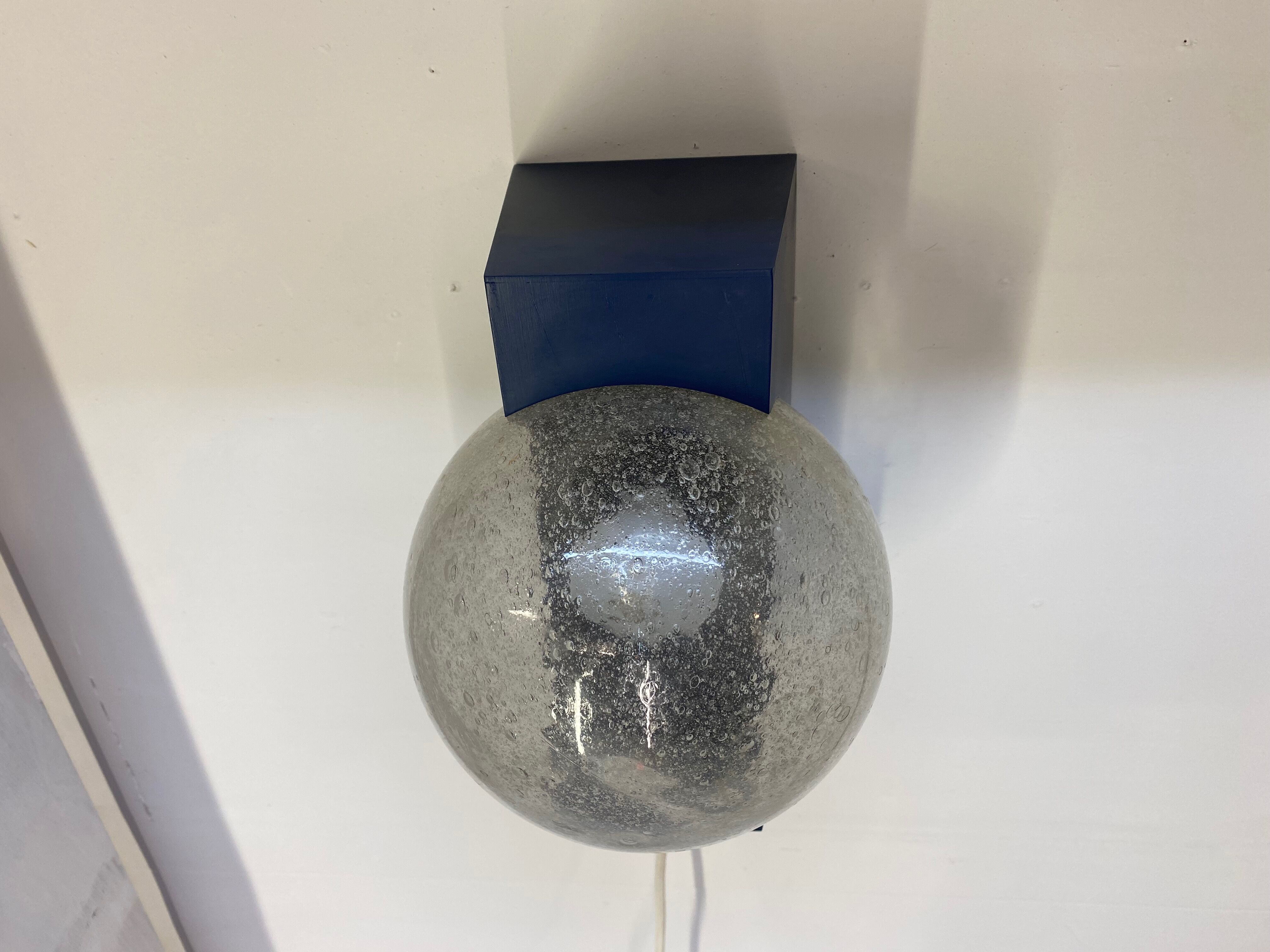 Vintage wall lamp by Raak design 1960