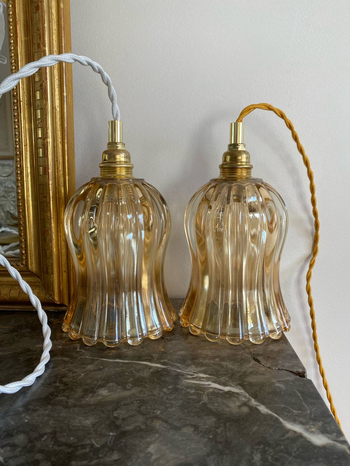 Pair of portable lamps with vintage amber glass globes