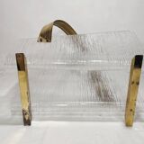 Revistero de metacrilato y latón. España, 1980s.