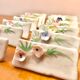 Set of 12 knife holders or porcelain table name holders
