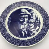 Blue enamelled earthenware wall plate with fisherman decor, Boch La Louvière, Belgium