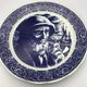 Blue enamelled earthenware wall plate with fisherman decor, Boch La Louvière, Belgium