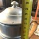 Old aluminum coffee maker, woven wicker handle