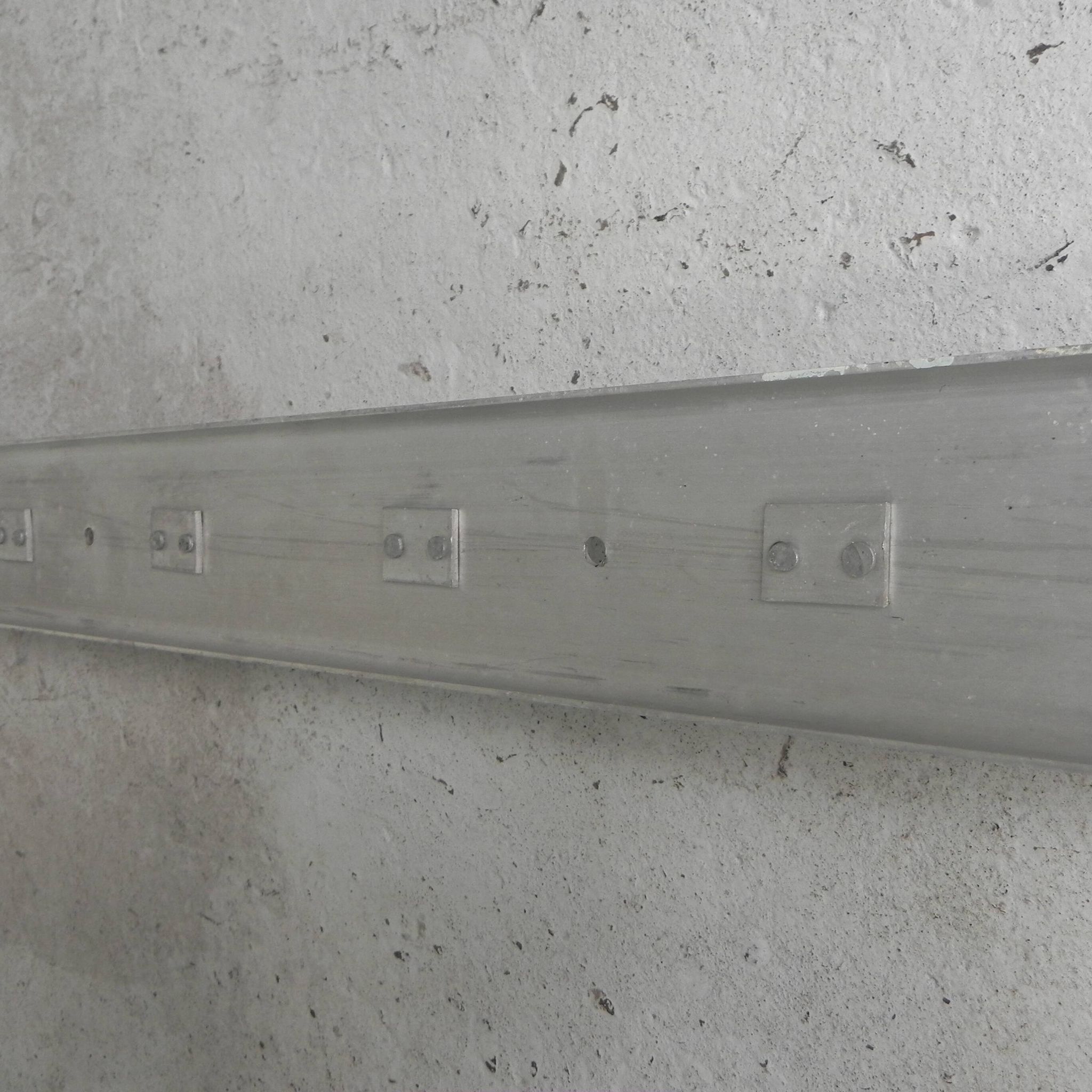 Wall-mounted aluminium coat rack of 225 cm with 16 double hooks, 1960s.