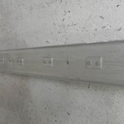 Wall-mounted aluminium coat rack of 225 cm with 16 double hooks, 1960s.