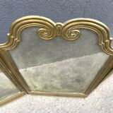 Antique brass fireplace screen from 1920, vintage spark guard.