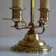 hot water bottle lamp with 2 bronze lights and burgundy sheet metal lampshade