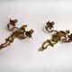 Pair of Rococo wall sconces in gilded bronze, Hollywood Regency, from the years.