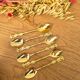 Golden metal spoons