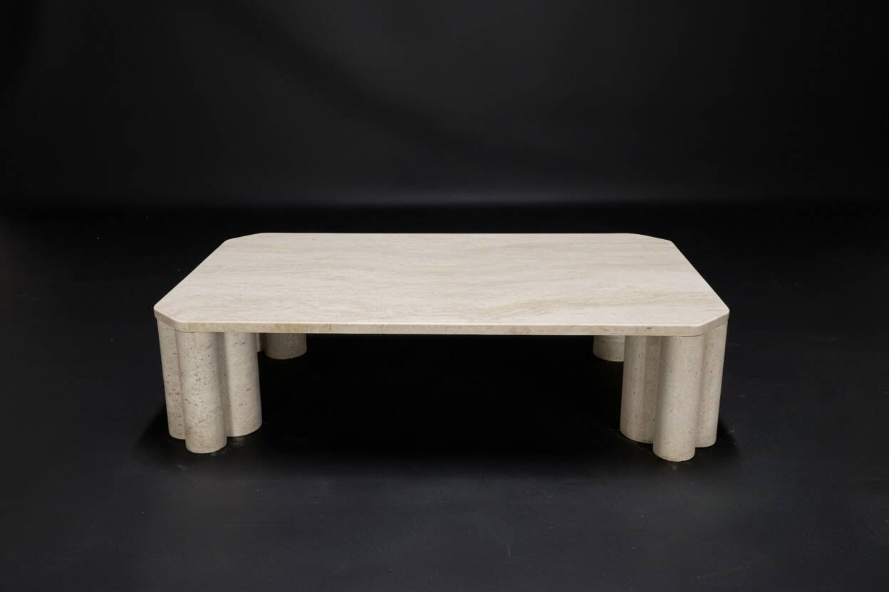 Antona travertine coffee table by the Italian publisher Up&Up.