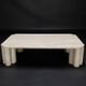 Antona travertine coffee table by the Italian publisher Up&Up.