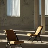 Pair of armchairs from the 50s-60s in boucle, mid-century Swedish design.