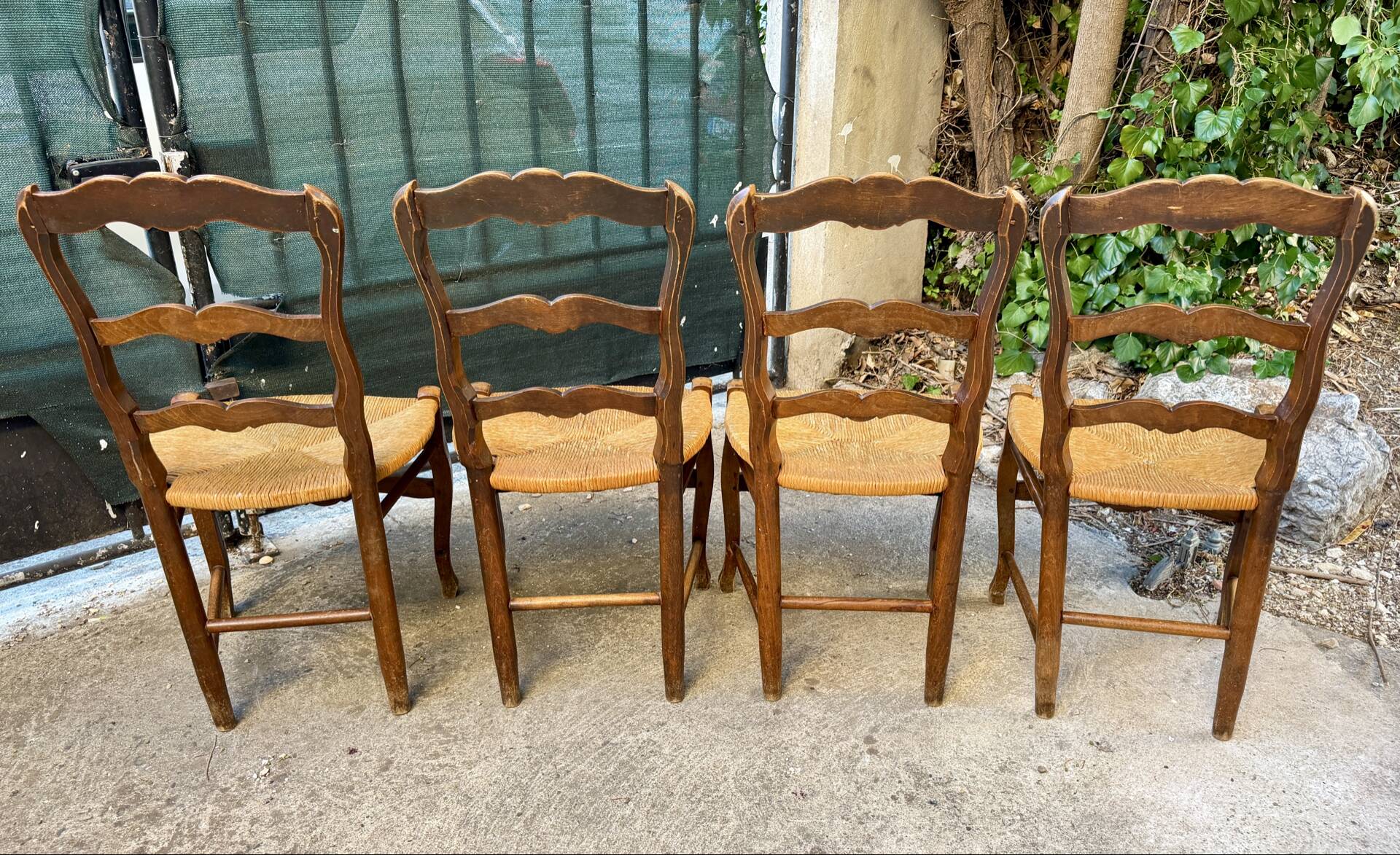 Set of 4 Provençal oak chairs with rush seats.