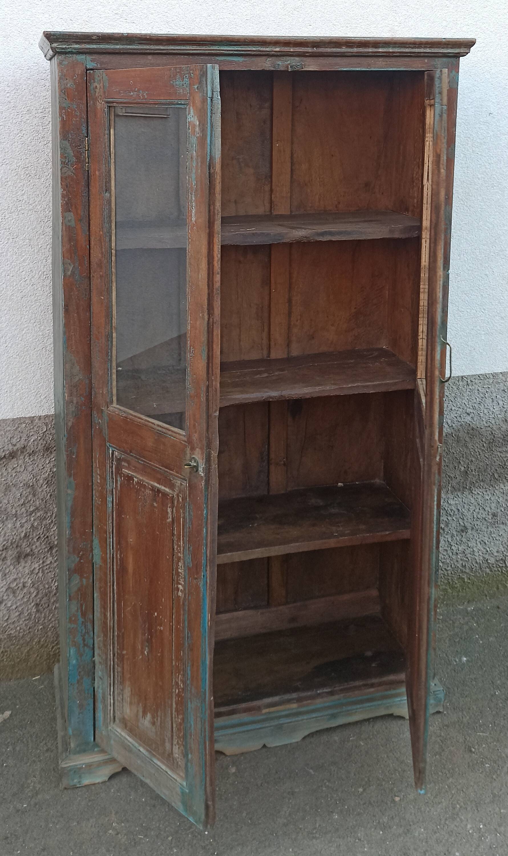 Old glazed wooden cabinet with beautiful patina