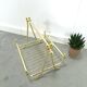 Gold magazine rack