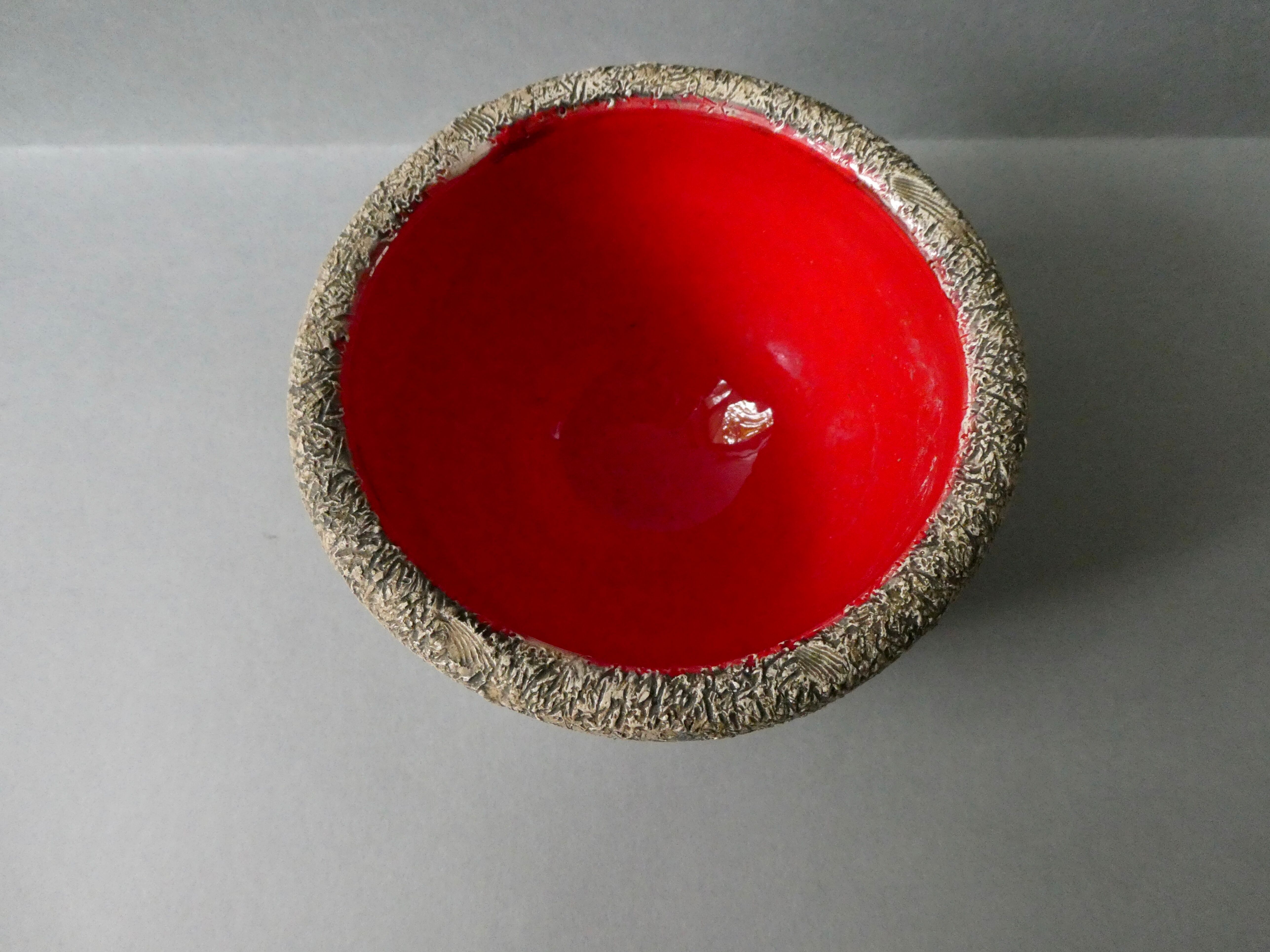 Red enamelled sandstone cup, Francis Triay, 50/60
