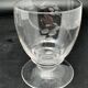 Set of fine glass stemmed glasses with small flower patterns